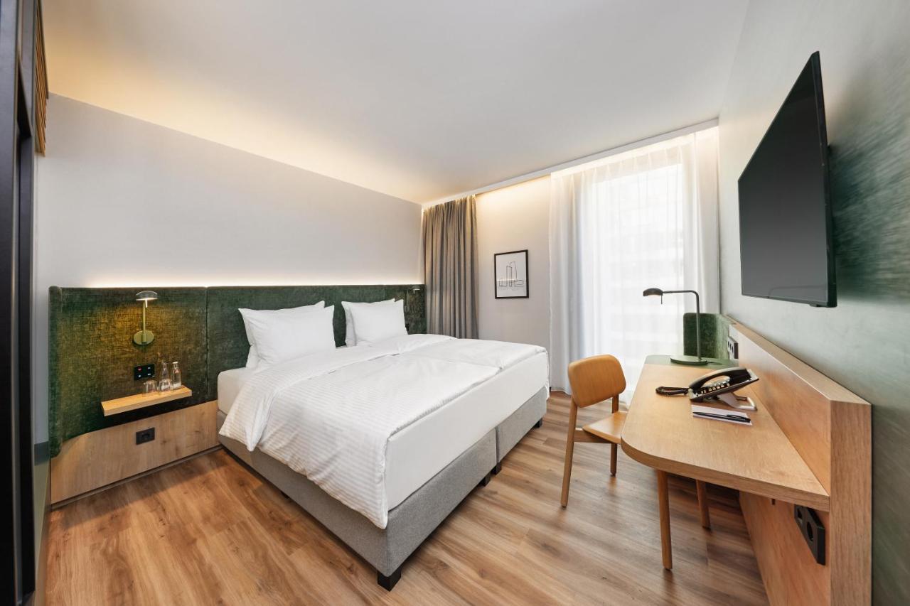 H+ Hotel Frankfurt แอชบอร์น ภายนอก รูปภาพ