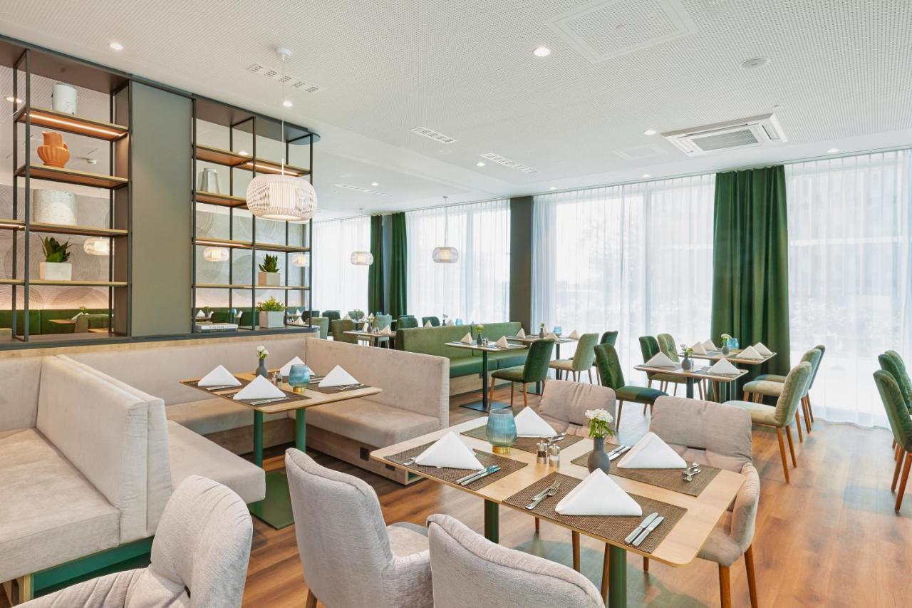 H+ Hotel Frankfurt แอชบอร์น ภายนอก รูปภาพ