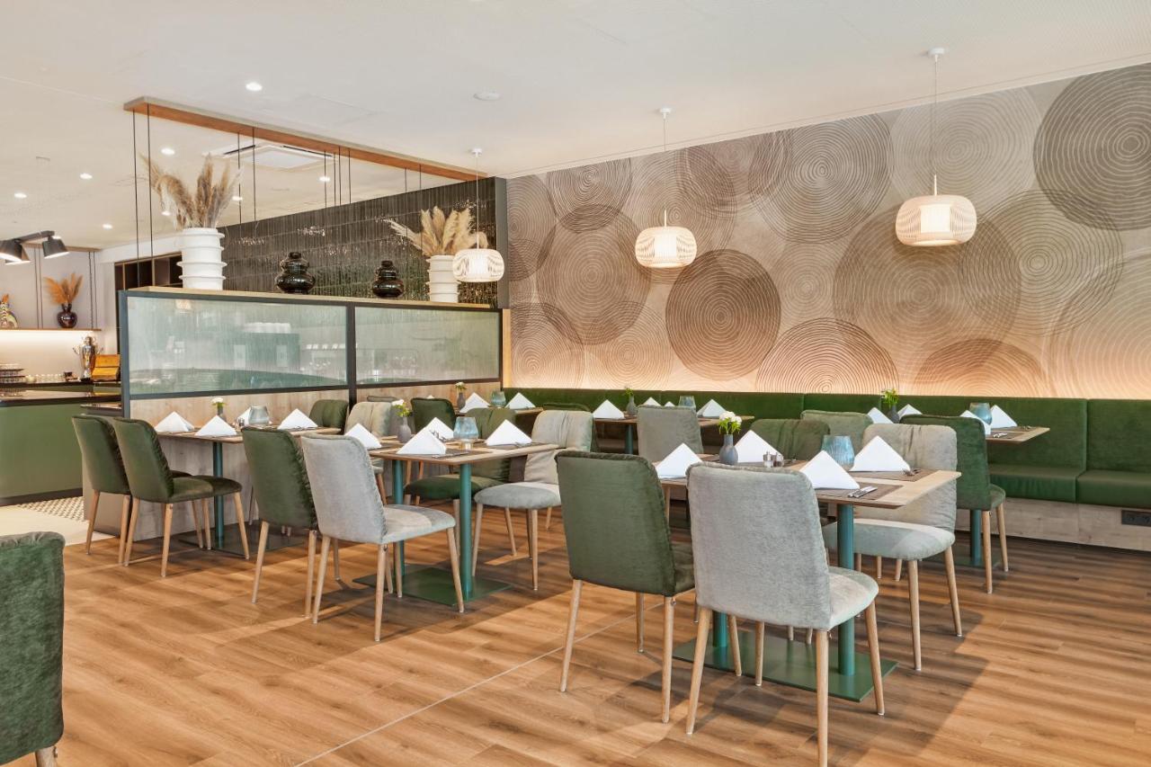 H+ Hotel Frankfurt แอชบอร์น ภายนอก รูปภาพ